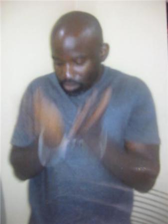 http://xa.yimg.com/kq/groups/27065299/sn/1168612099/name/ikenna+with+cuffs.jpg