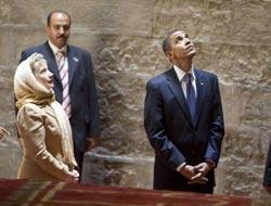 Why??? Was Sec of State Hillary Clinton wearing a head dress today in Cairo???